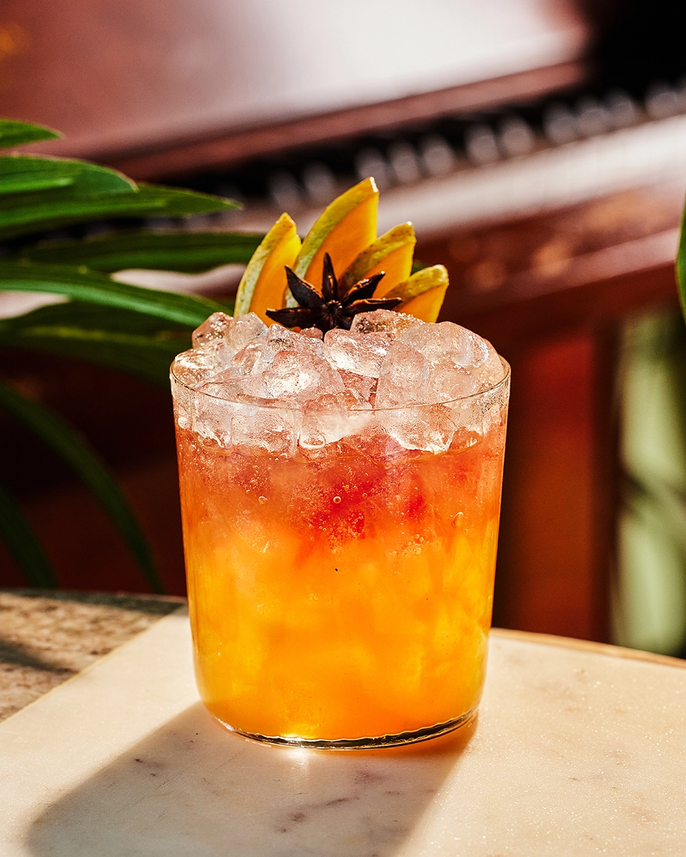 Mint cocktail on yellow table